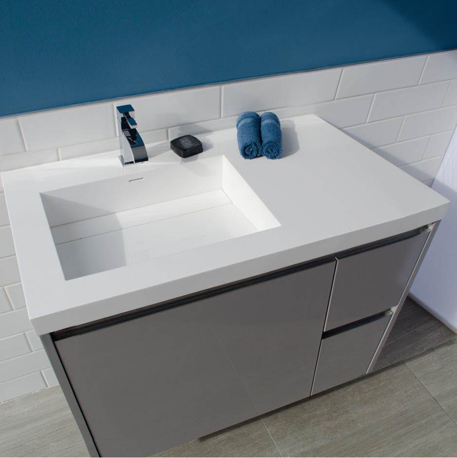 Lacava Vanity-top Bathroom Sink made of solid surface, with an overflow and decorative drain cover.